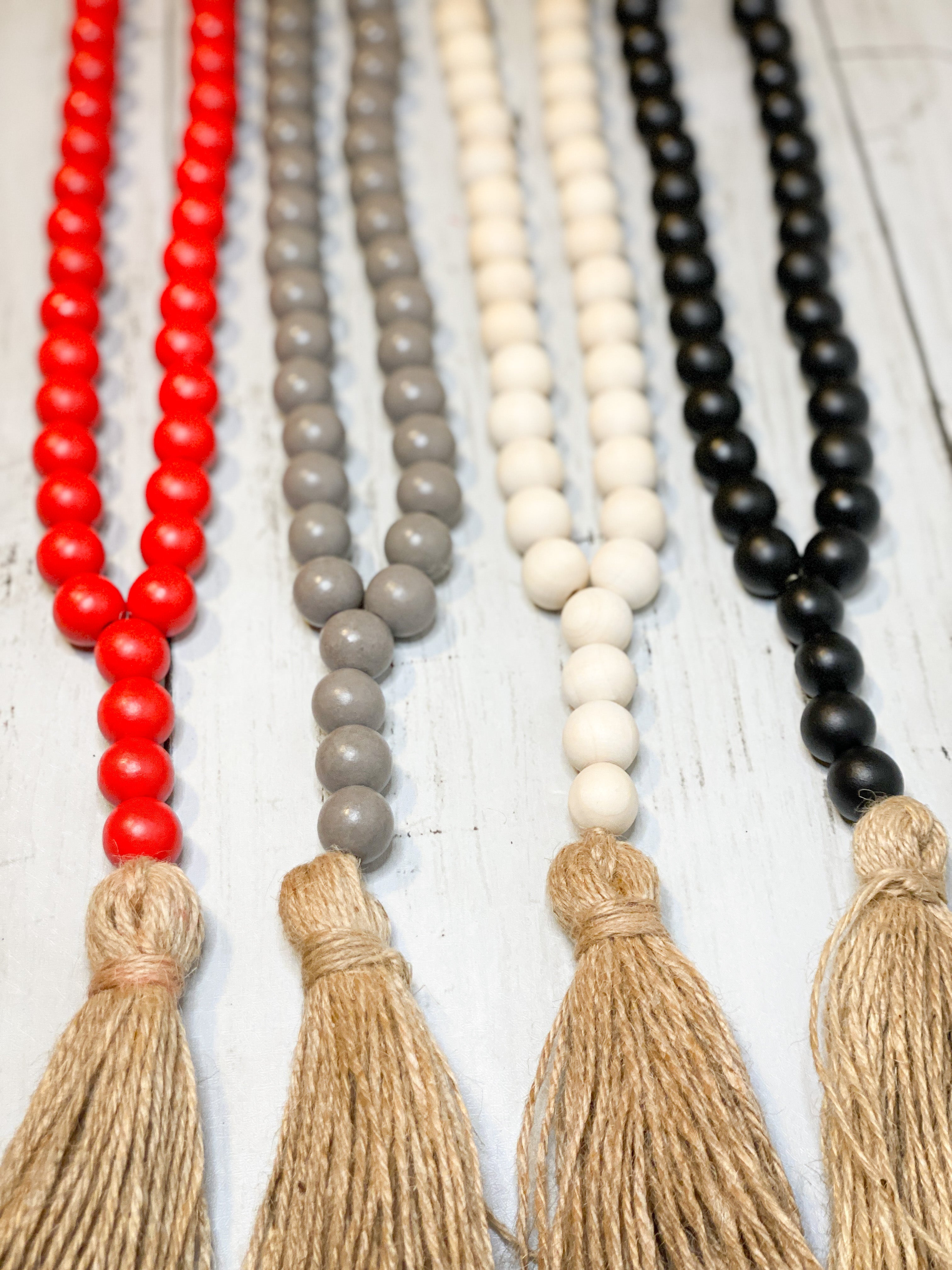 Wooden Bead Strand With Tassel