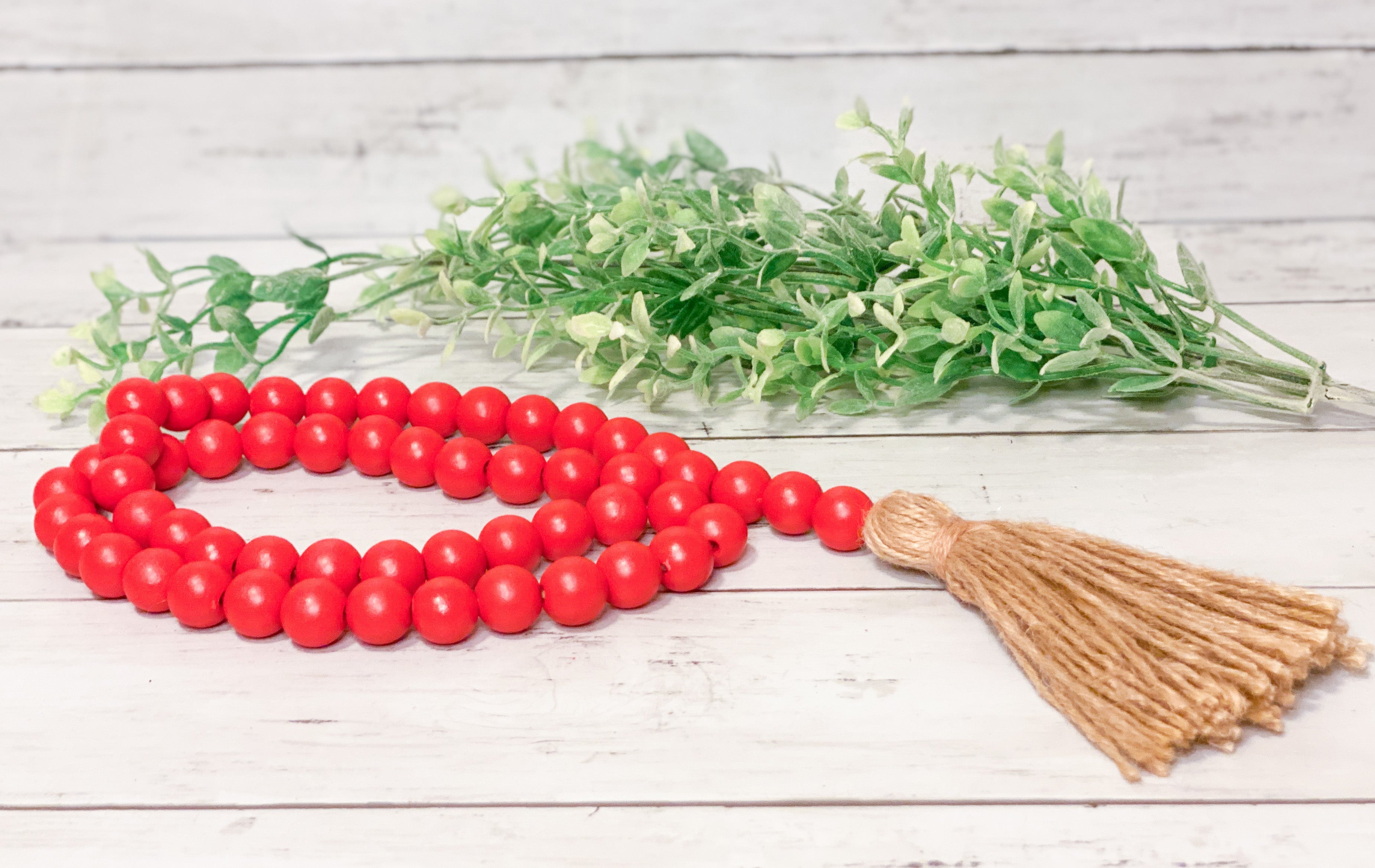 Wooden Bead Strand With Tassel