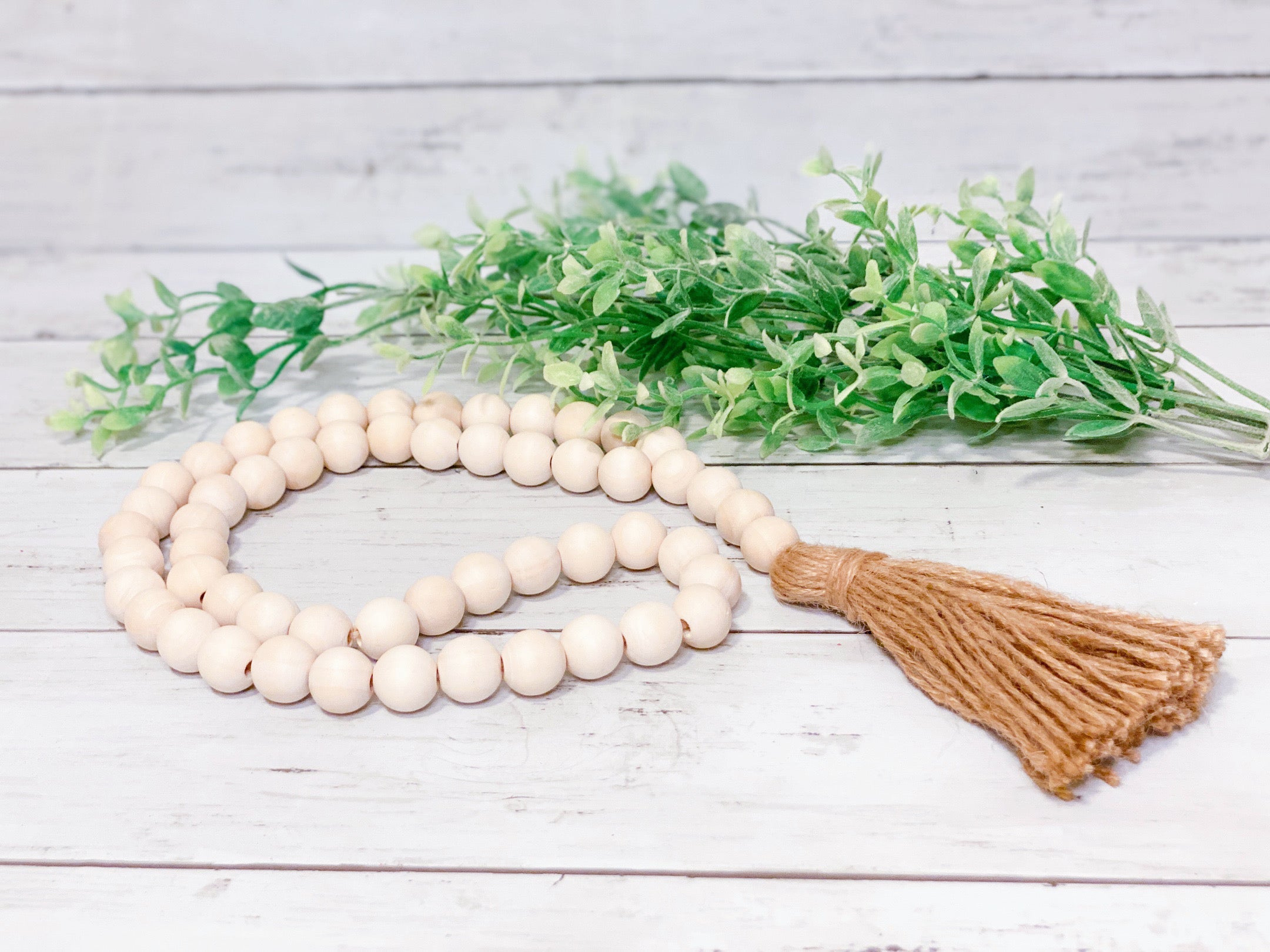 Wooden Bead Strand With Tassel